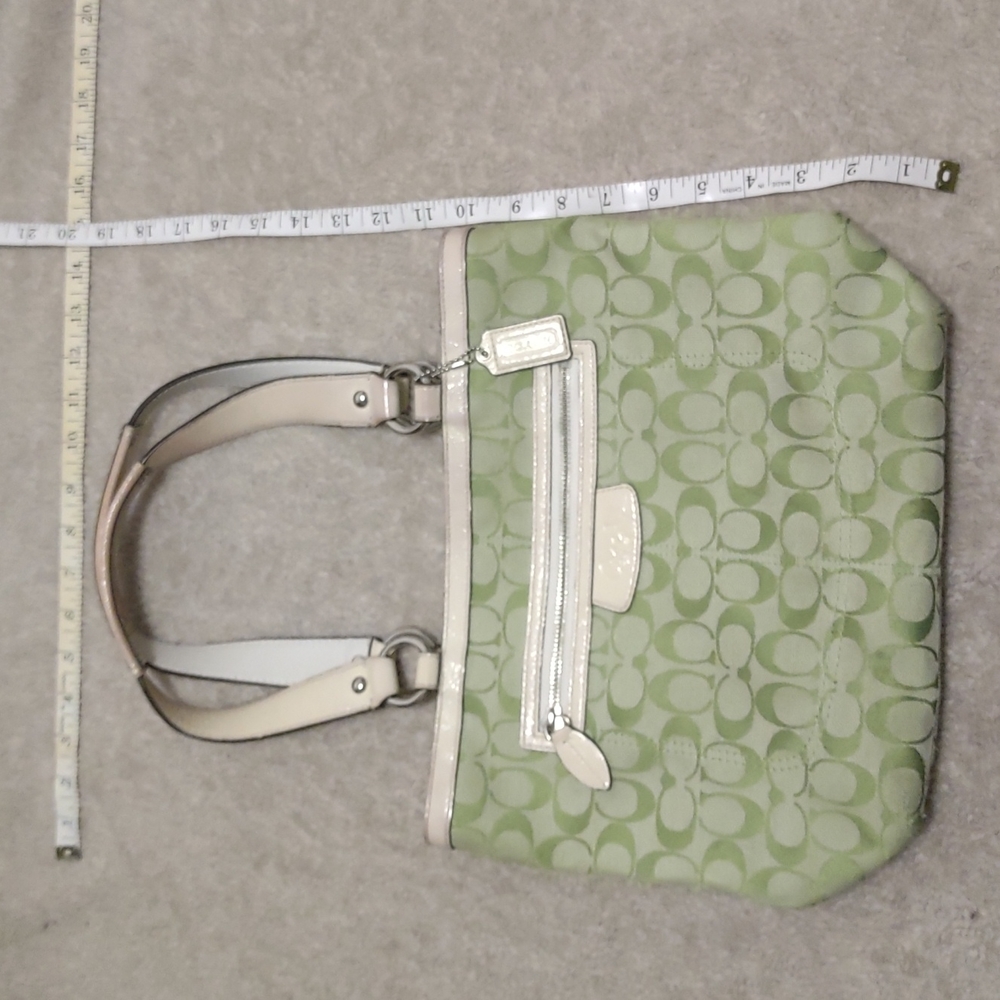Coach green signature used and shows signs of wear